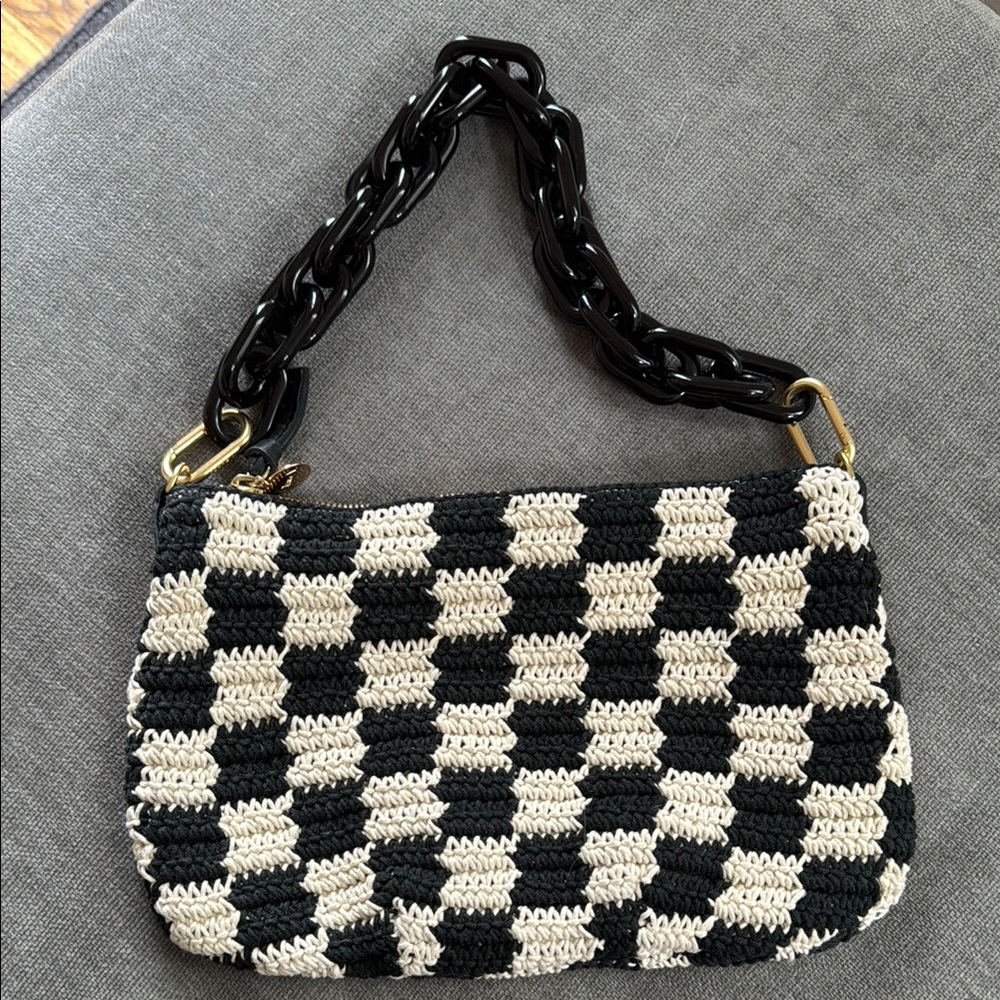 Black and Cream Checkered Clare V purse with thick plastic strap